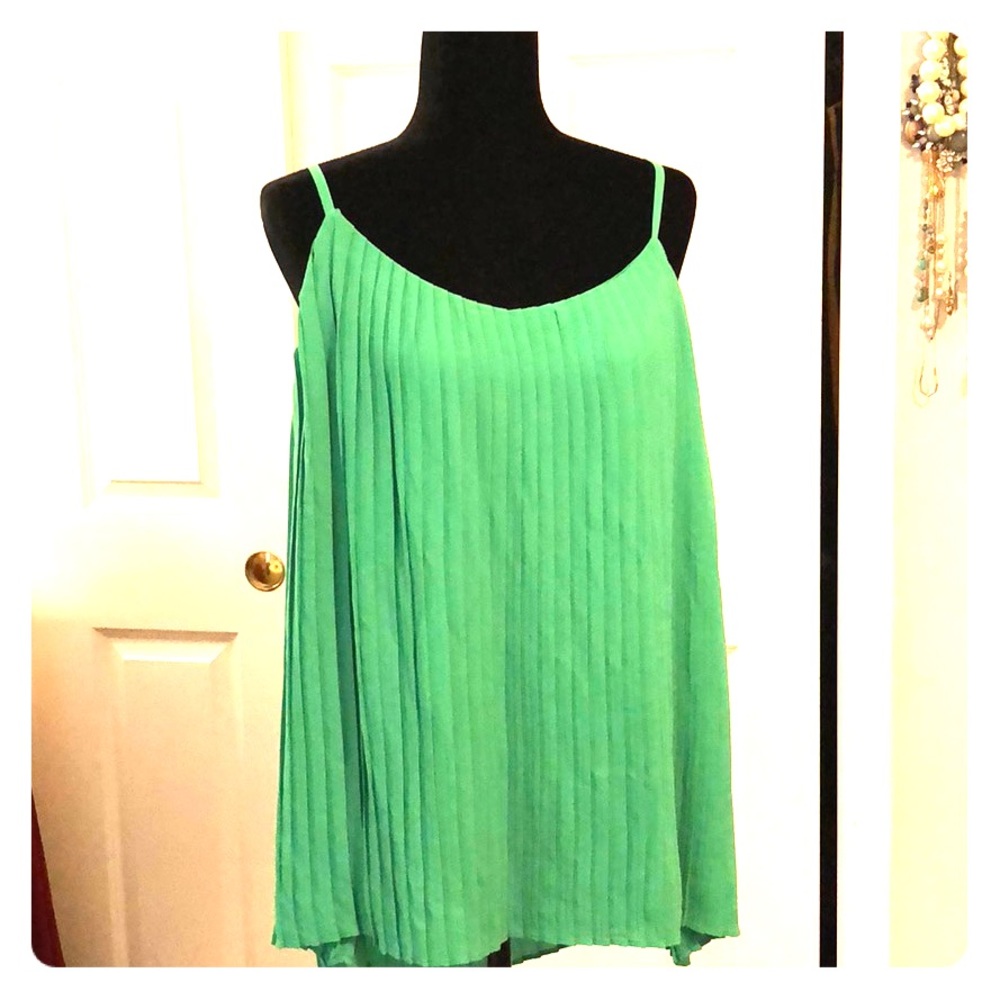 Spaghetti strap ruffled blouse.
